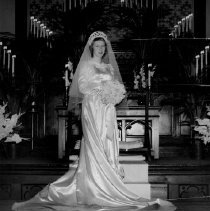 Joan Ostrander Married in Church Ceremony